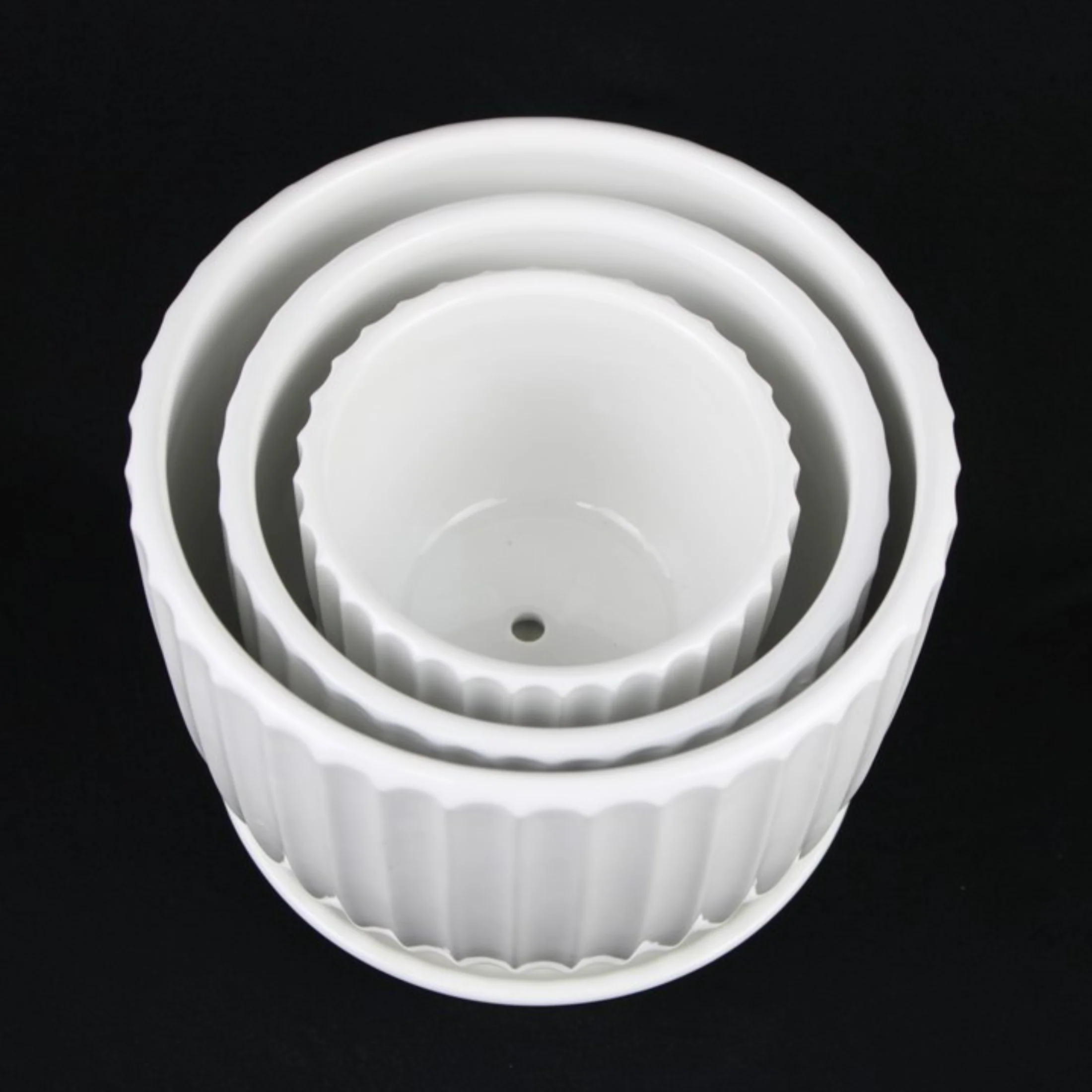 3-Piece White Ceramic Planter Pot Set with Vertical Fluted Design & Matching Saucers - Image 7
