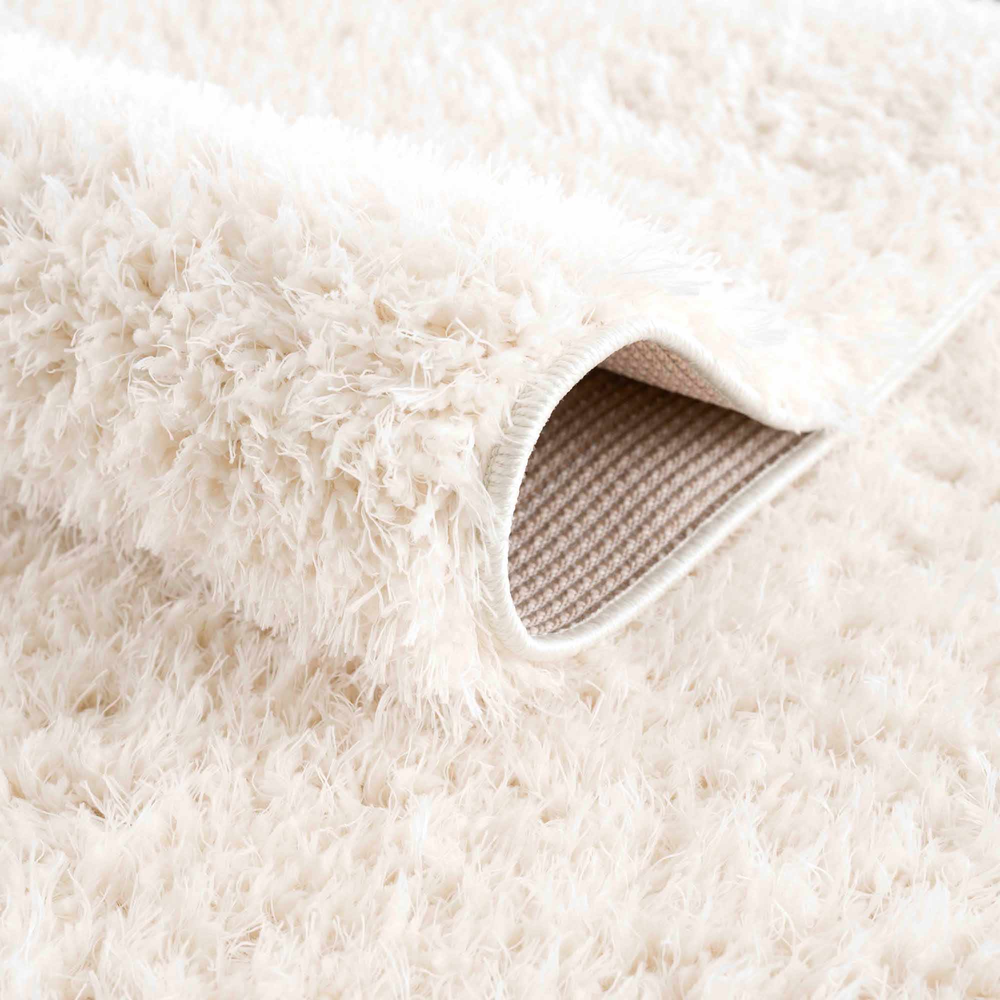 Faina Solid Cream Shag Washable Area Rug - Image 7